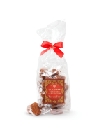 Sachet de caramels tendres au beurre salé - de face avec caramels sortis