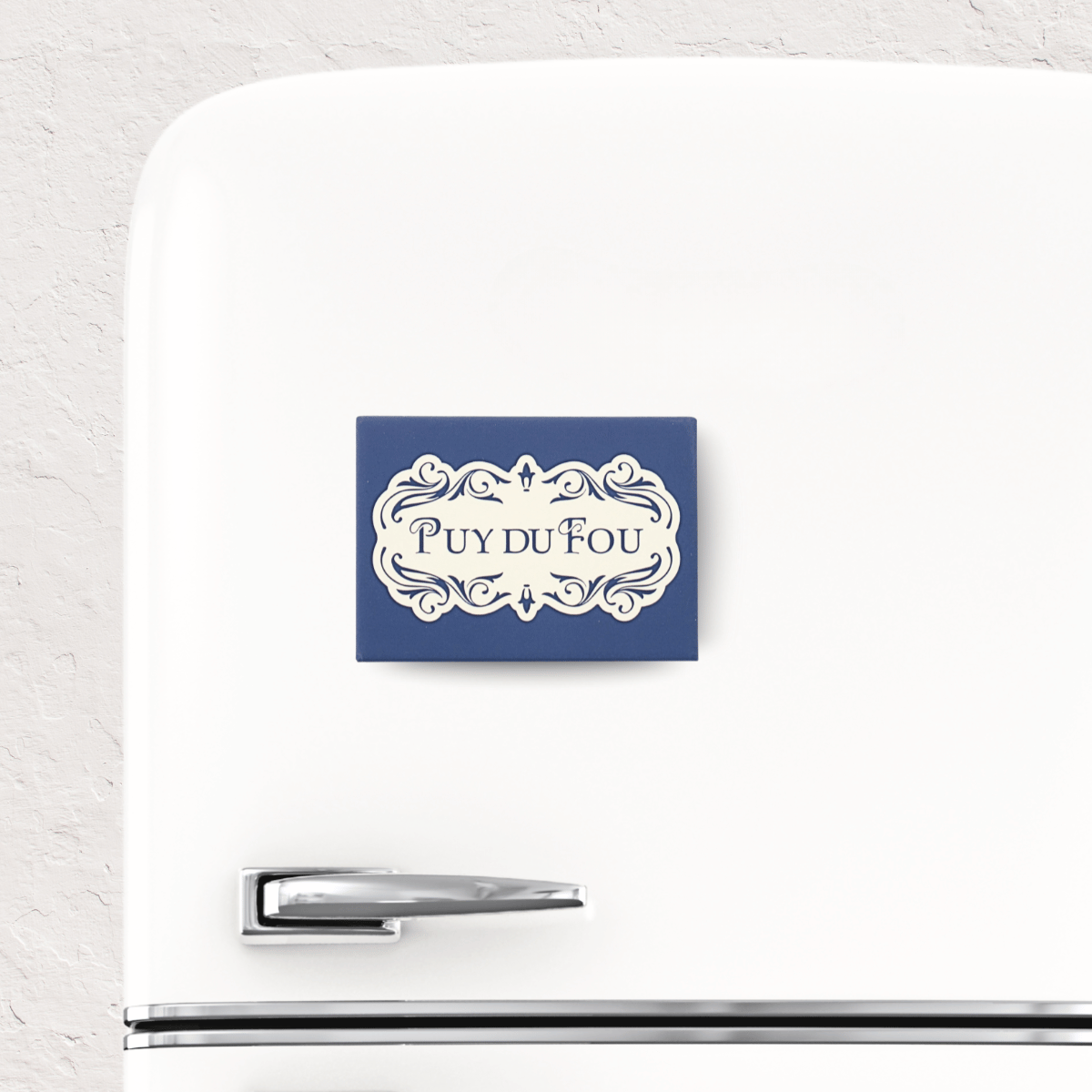 Magnet Puy du Fou 1900 bleu - sur frigo