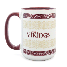 Détail du grand mug céramique Les Vikings Puy du Fou, bandes de motifs géométriques dorés et bordures bordeaux inspirés du costume de Sybèle