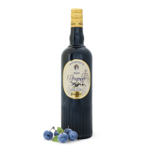 Troussepinette L'Originale Epines Noires - de face avec des épines noires à côté de la bouteille