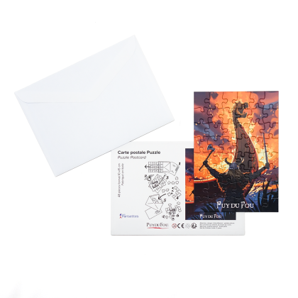 Ensemble carte postale puzzle Les Vikings avec enveloppe blanche, carte d'instructions à gauche et puzzle assemblé du drakkar à droite