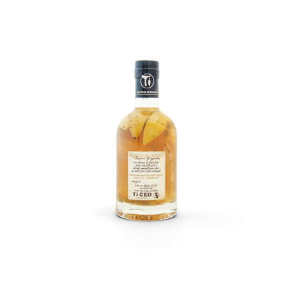 Dos de la bouteille 35cl de punch au rhum passion-gingembre Puy du Fou, étiquette Ti CED Arrangés et morceaux de fruits de la passion
