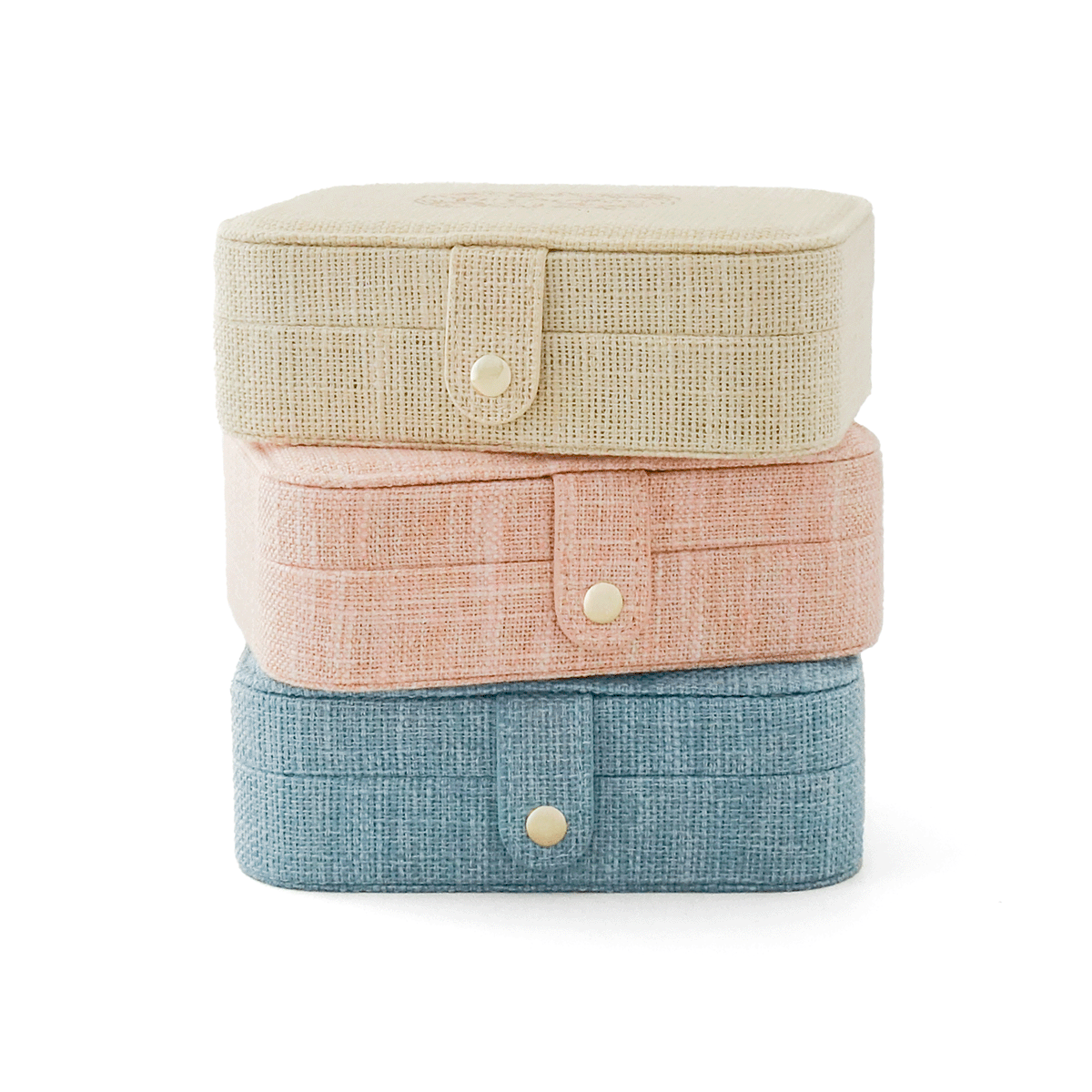 Grande boîte à bijoux effet lin Puy du Fou – 3 coloris beige, rose et bleu empilés, vue de face