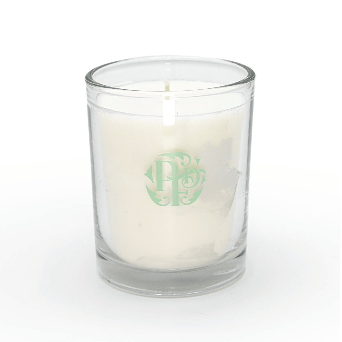 Bougie parfumée à la verveine et au citron dans un contenant en verre élégant, boutique officielle du Puy du Fou.