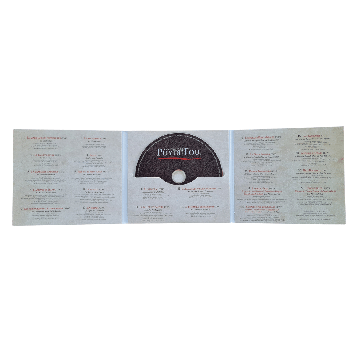 Intérieur du CD Les musiques du Puy du Fou édition 2022, avec des éléments graphiques colorés, boutique officielle du Puy du Fou.