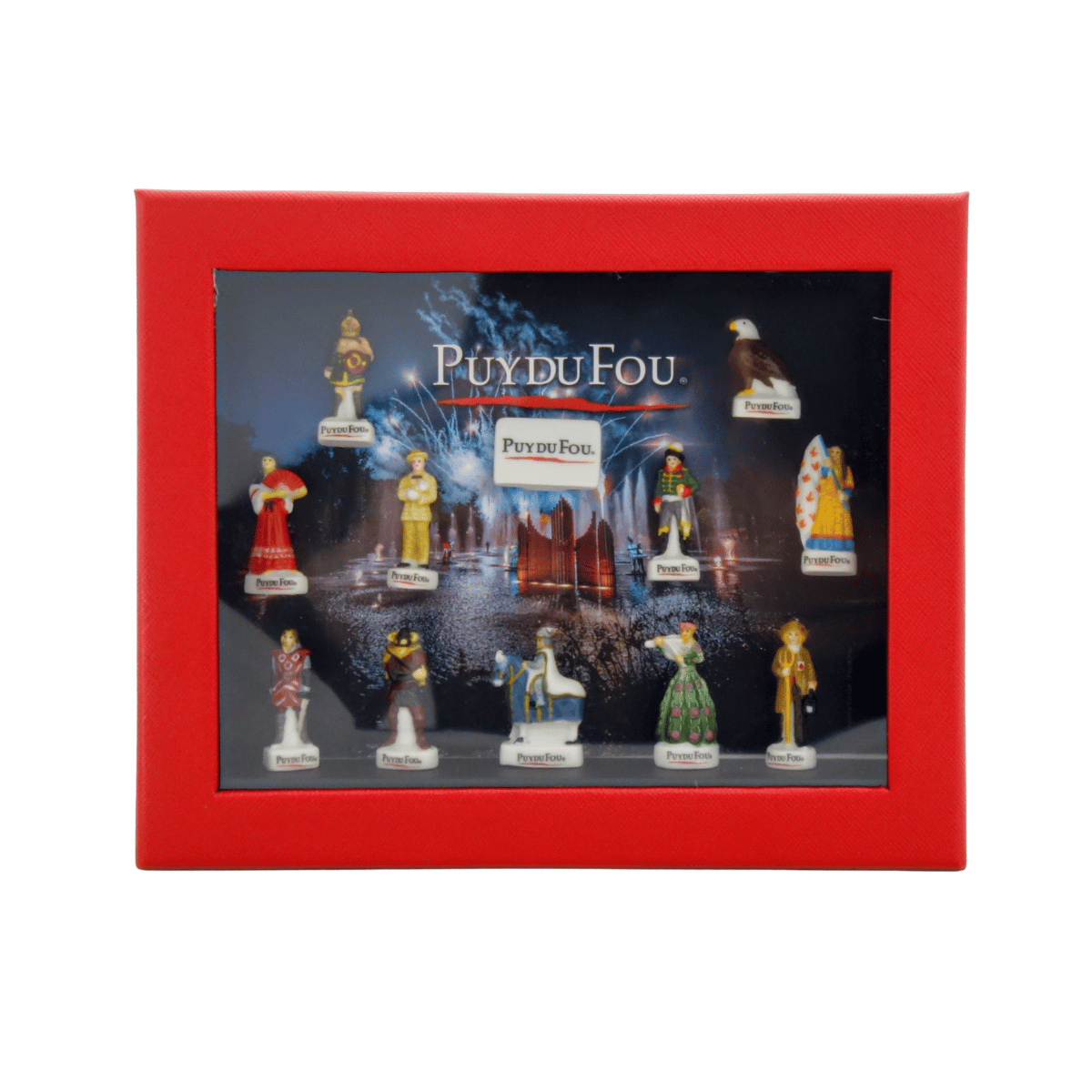 Vue de face du coffret rouge fermé Puy du Fou : fenêtre transparente avec les 12 fèves en porcelaine visibles et le logo “Puy du Fou” au centre du décor.