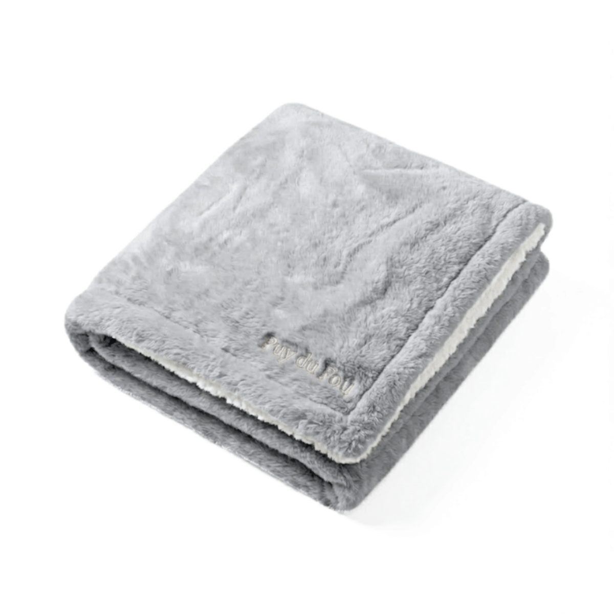 Plaid Puy du Fou – Doublé Effet Mouton gris, plié à plat, présentation mettant en avant l’épaisseur et le confort.