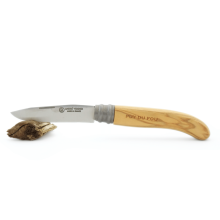 Couteau alpage en olivier - ouvert sur support